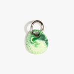 Dinosaur Designs Earth Keyring in Grass — handcrafted marbled light and dark green resin pebble bead on a polished gunmetal jump ring