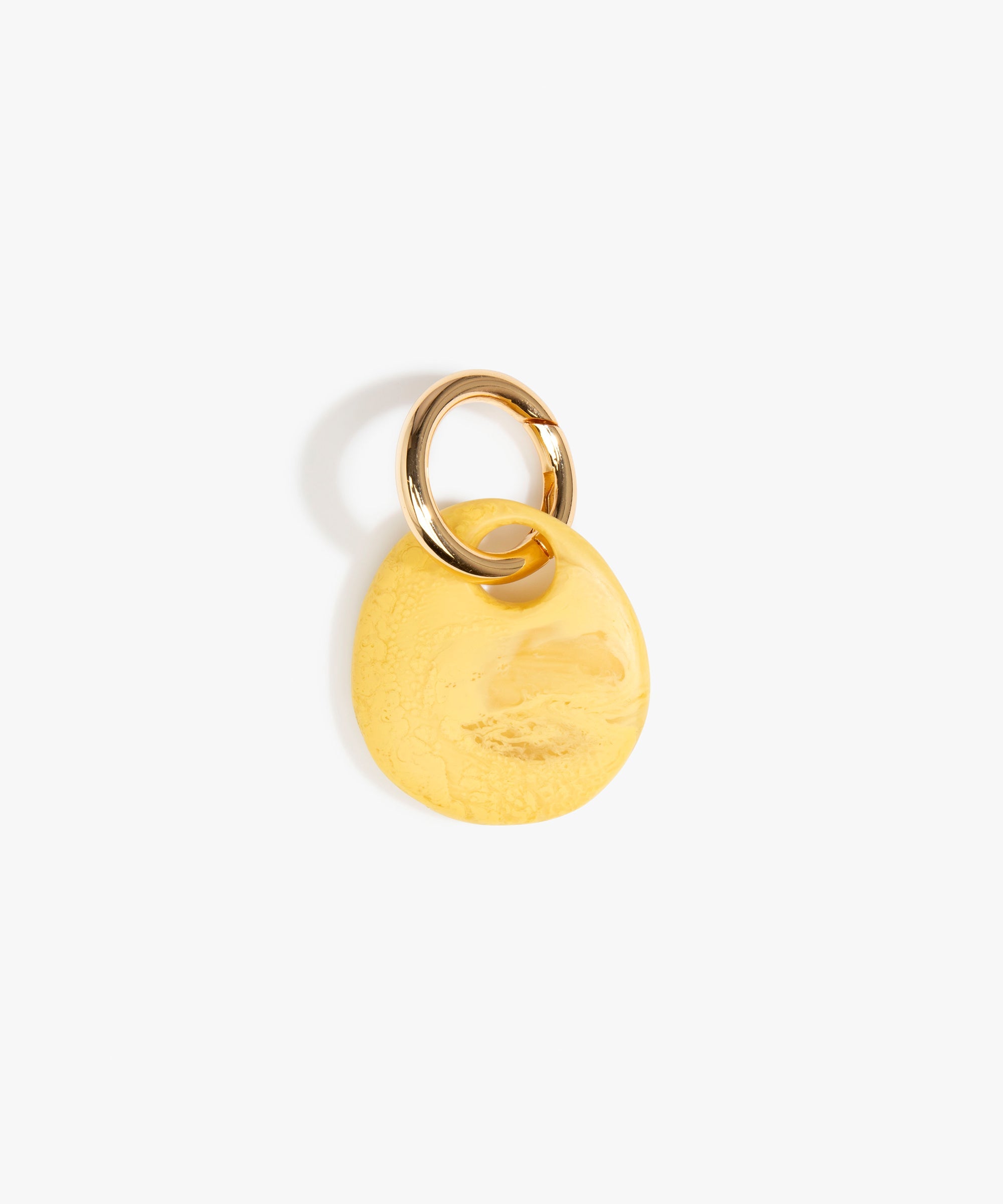 Dinosaur Designs Earth Keyring in Pollen — handcrafted marbled yellow and clear resin pebble bead on a polished brass jump ring