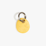 Dinosaur Designs Earth Keyring in Pollen — handcrafted marbled yellow and clear resin pebble bead on a polished gunmetal jump ring