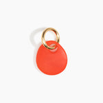 Dinosaur Designs Earth Keyring in Poppy — handcrafted marbled red resin pebble bead on a polished brass jump ring