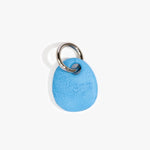 Dinosaur Designs Earth Keyring in Sky — handcrafted marbled blue and clear resin pebble bead on a polished gunmetal jump ring