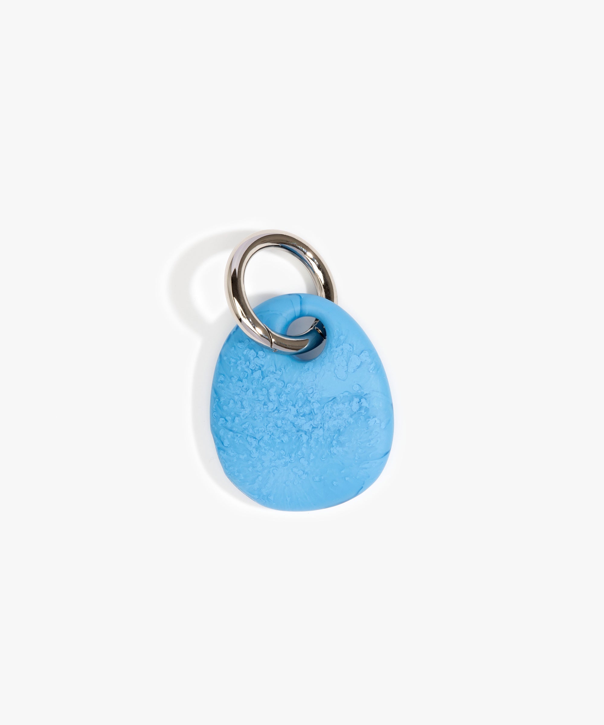 Dinosaur Designs Earth Keyring in Sky — handcrafted marbled blue and clear resin pebble bead on a polished gunmetal jump ring