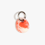 Dinosaur Designs Earth Keyring in Strawberry — handcrafted marbled light and dark red resin pebble bead on a polished gunmetal jump ring