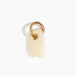 Dinosaur Designs Rock Keyring in Cream — handcrafted cream resin pebble bead on a polished brass jump ring