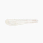 Dinosaur Designs Temple Cake Knife in Chalk Swirl — handcrafted marbled off white resin cake knife with smooth tapered blade and rounded handle