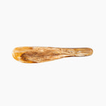 Dinosaur Designs Temple Cake Knife in Light Horn — handcrafted marbled brown, cream and clear resin cake knife with smooth tapered blade and rounded handle