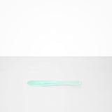 Dinosaur Designs Temple Cake Knife in Mint — handcrafted marbled green blue resin cake knife with smooth tapered blade and rounded handle