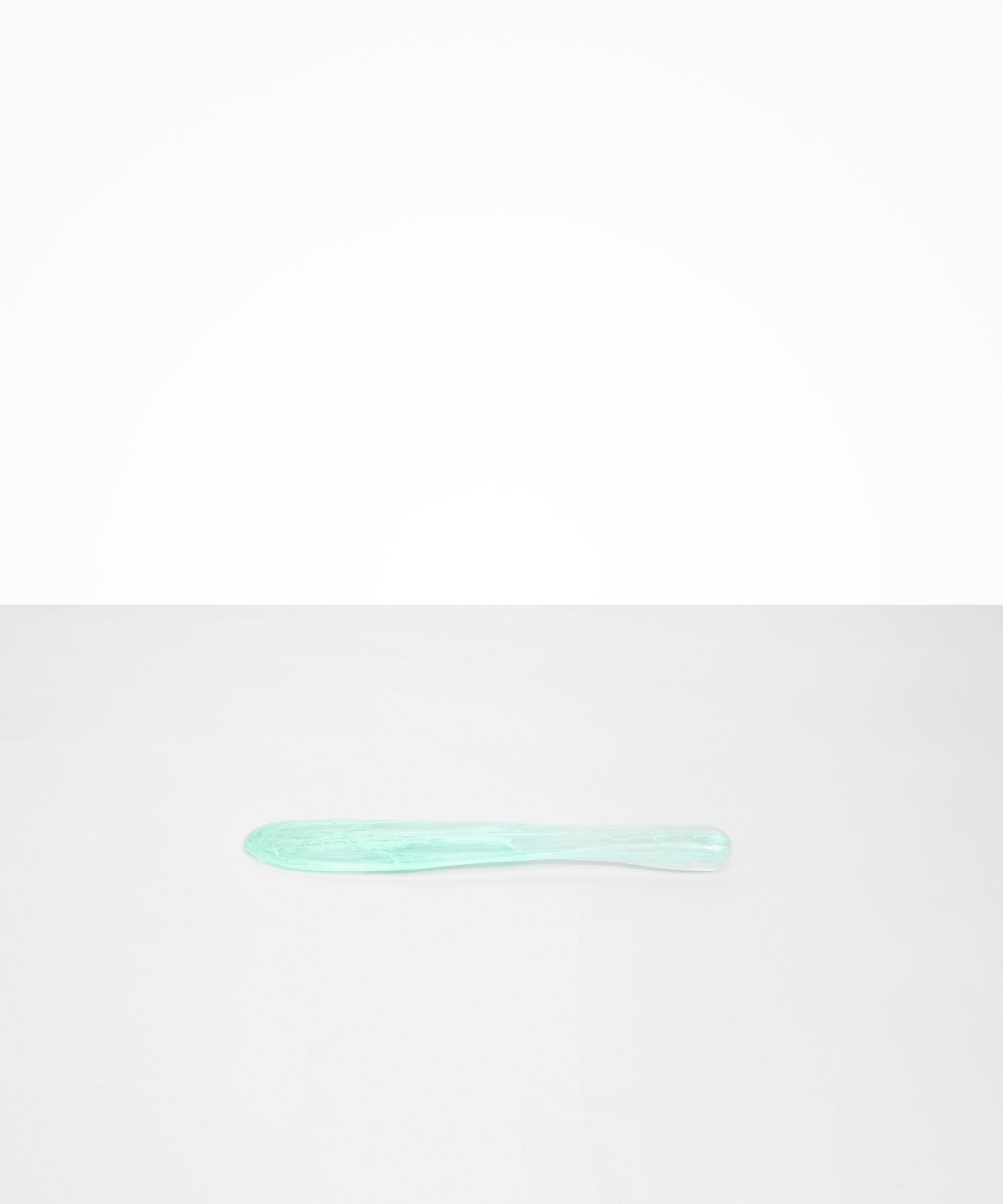 Dinosaur Designs Temple Cake Knife in Mint — handcrafted marbled green blue resin cake knife with smooth tapered blade and rounded handle