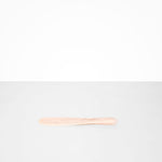 Dinosaur Designs Temple Cake Knife in Rose Swirl — handcrafted marbled dusty pink resin cake knife with smooth tapered blade and rounded handle