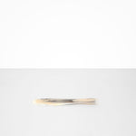 Dinosaur Designs Temple Cake Knife in Sandy Pearl — handcrafted marbled beige, grey and pearlescent resin cake knife with smooth tapered blade and rounded handle