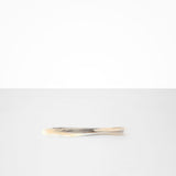 Dinosaur Designs Temple Cake Knife in Sandy Pearl — handcrafted marbled beige, grey and pearlescent resin cake knife with smooth tapered blade and rounded handle