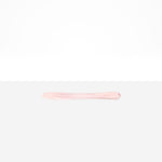 Dinosaur Designs Temple Cake Knife in Shell Pink — handcrafted marbled pale pink resin cake knife with smooth tapered blade and rounded handle