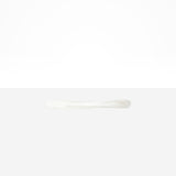 Dinosaur Designs Temple Cake Knife in Snow Swirl — handcrafted marbled white and clear resin cake knife with smooth tapered blade and rounded handle