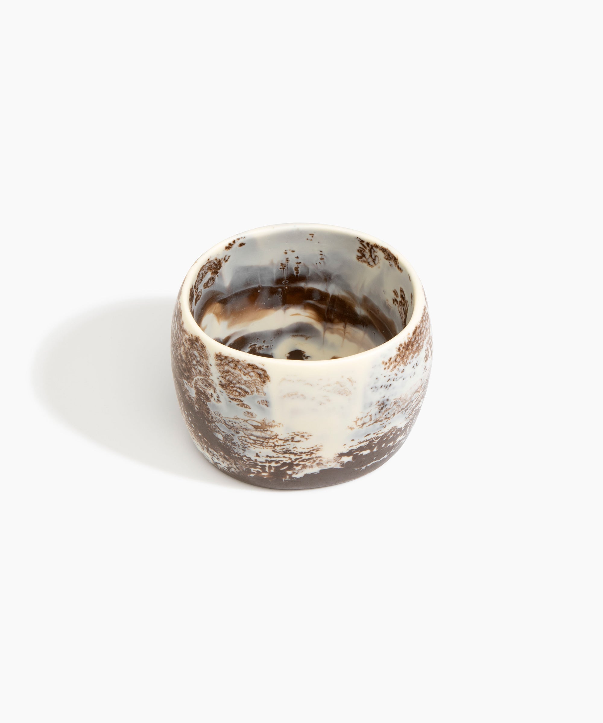 Dinosaur Designs Rock Totem Vase in Cappuccino — handcrafted pink marbled resin vase with organic silhouette..