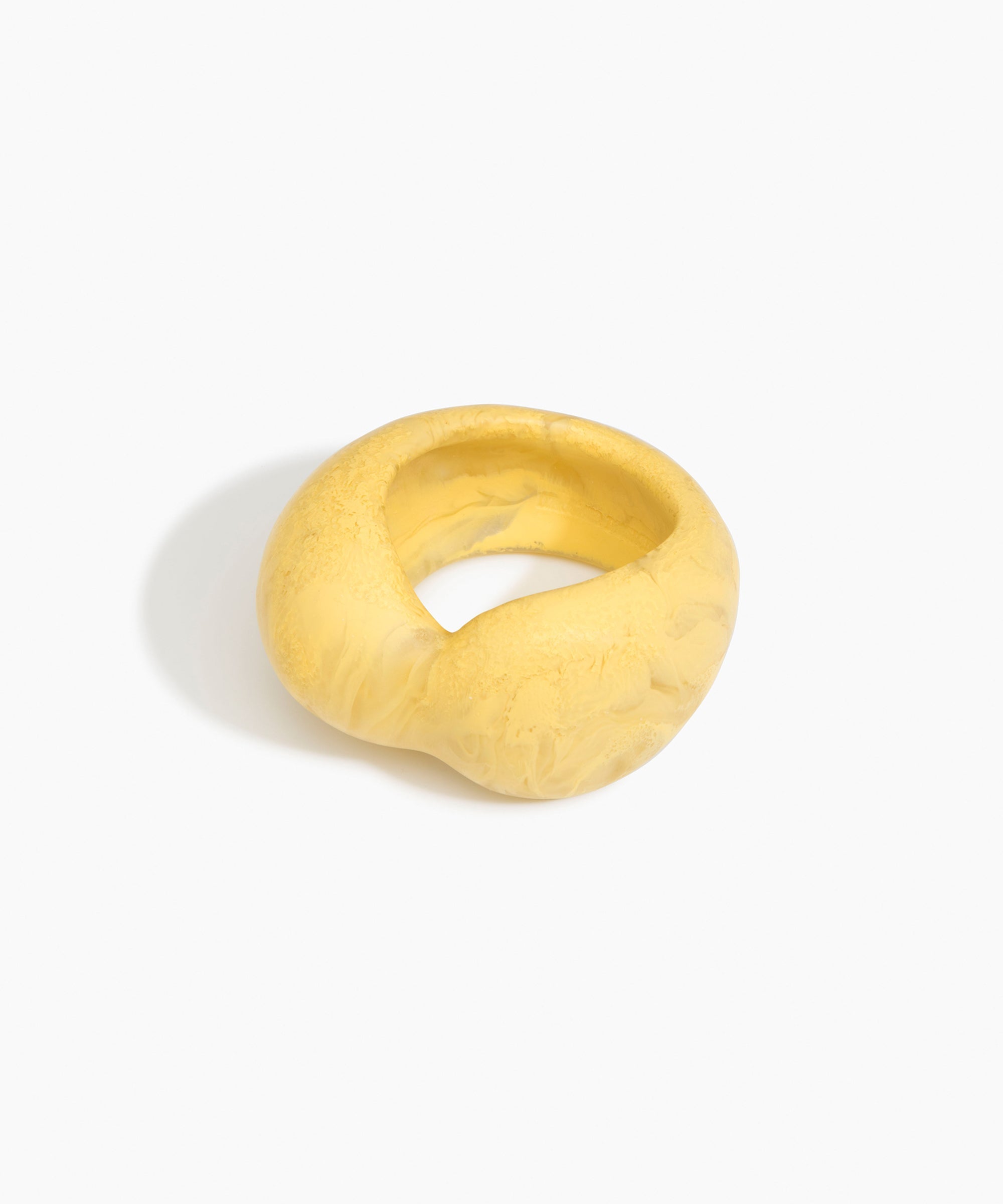 Dinosaur Designs Bold Sprout Bangle in Pollen — handcrafted marbled yellow resin bangle with oversized chunky form