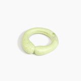 Dinosaur Designs Large Sprout Bangle in Pistachio — handcrafted marbled pastel green resin bangle with chunky rounded form