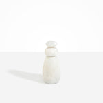Dinosaur Designs Tall Pepper Boulder Grinder in Chalk Swirl — handcrafted marbled off-white resin pepper grinder with elongated teardrop body and stacked pebble lid