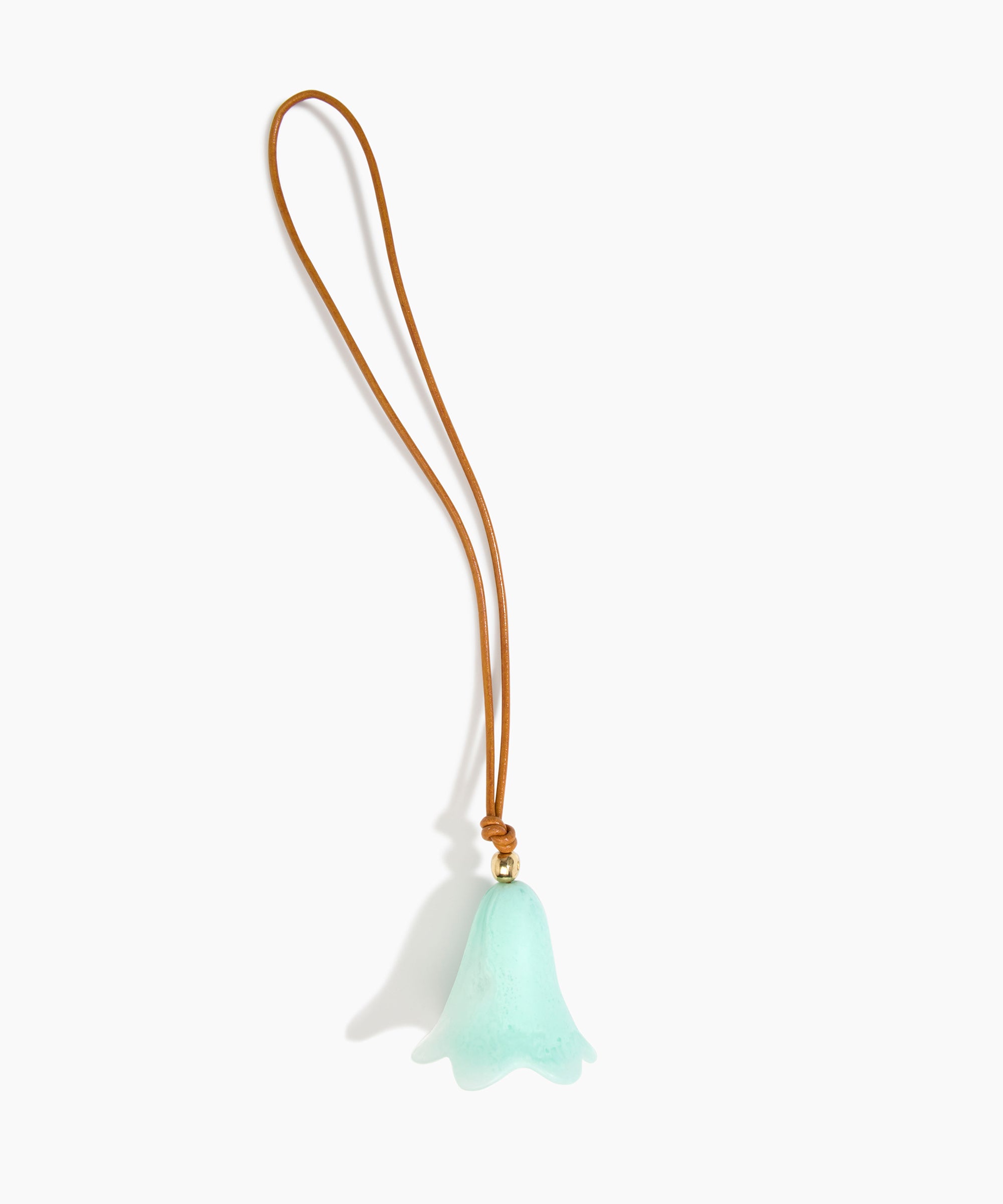 Dinosaur Designs Flower Bag Charm in Mint colour with Brass bead — handcrafted marbled mint blue resin bell-shaped flower bag charm with tan leather hanging loop and brass bead