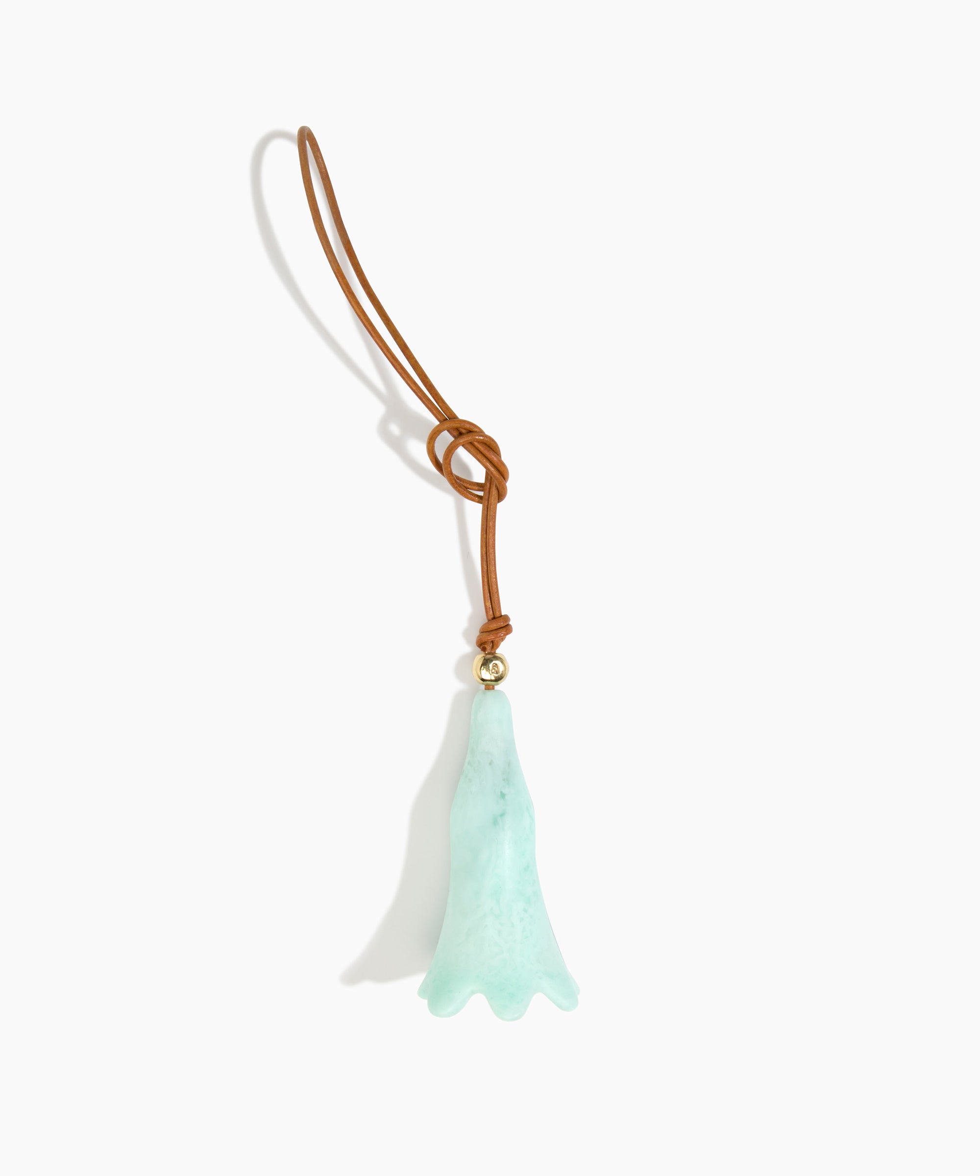 Dinosaur Designs Long Flower Bag Charm in Mint colour with Brass bead — handcrafted marbled mint blue resin bell-shaped flower bag charm with tan leather hanging loop and brass bead