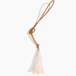 Dinosaur Designs Long Flower Bag Charm in Rose Swirl colour with Brass bead — handcrafted marbled dusty pink resin bell-shaped flower bag charm with tan leather hanging loop and brass bead