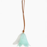 Dinosaur Designs Flower Decoration in Mint colour with Brass bead — handcrafted marbled mint blue resin bell-shaped flower ornament with tan leather hanging loop and brass bead