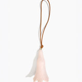 Dinosaur Designs Long Flower Decoration in Rose Swirl colour with Brass bead — handcrafted marbled dusty pink resin bell-shaped flower ornament with tan leather hanging loop and brass bead
