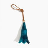 Dinosaur Designs Long Flower Decoration in Turquoise colour with Brass bead — handcrafted marbled teal blue resin bell-shaped flower ornament with tan leather hanging loop and brass bead
