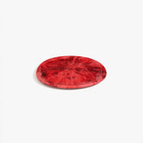 Dinosaur Designs Rock Plate in Cranberry — handcrafted marbled red resin oval flat serving plate with rounded organic edge