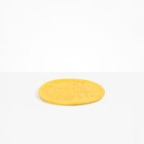 Dinosaur Designs Rock Plate in Pollen — handcrafted marbled yellow resin oval flat serving plate with rounded organic edge