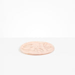 Dinosaur Designs Rock Plate in Rose Swirl — handcrafted marbled dusty pink resin oval flat serving plate with rounded organic edge
