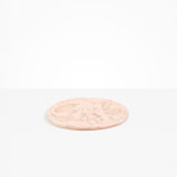 Dinosaur Designs Rock Plate in Rose Swirl — handcrafted marbled dusty pink resin oval flat serving plate with rounded organic edge