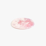 Dinosaur Designs Rock Plate in Shell Pink — handcrafted marbled pink resin oval flat serving plate with rounded organic edge