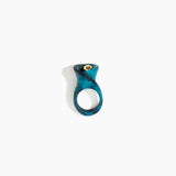 Dinosaur Designs Long Lily Ring in Turquoise — handcrafted marbled teal blue resin ring with sculptural swirled flower and brass bead