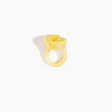 Dinosaur Designs Lily Ring in Pollen — handcrafted marbled yellow resin ring with sculptural swirled flower