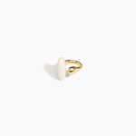 Dinosaur Designs Polished Lotus Ring in Chalk Swirl with Brass — marbled off-white resin elongated oval ring with  brass band and small brass ball detail
