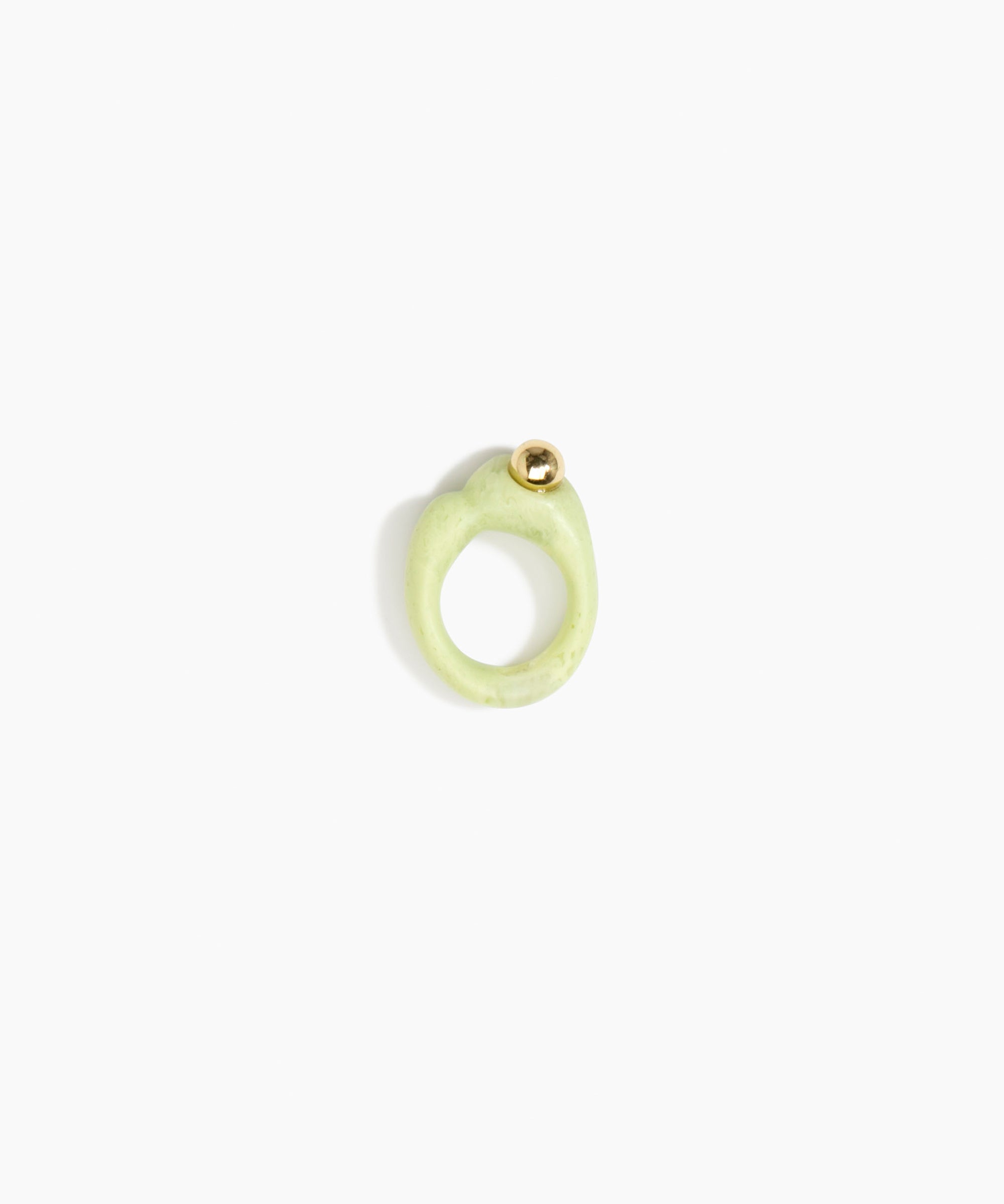 Dinosaur Designs Sprout Dot Ring in Pistachio with Brass — handcrafted marbled pastel green resin organic band ring with polished brass bead