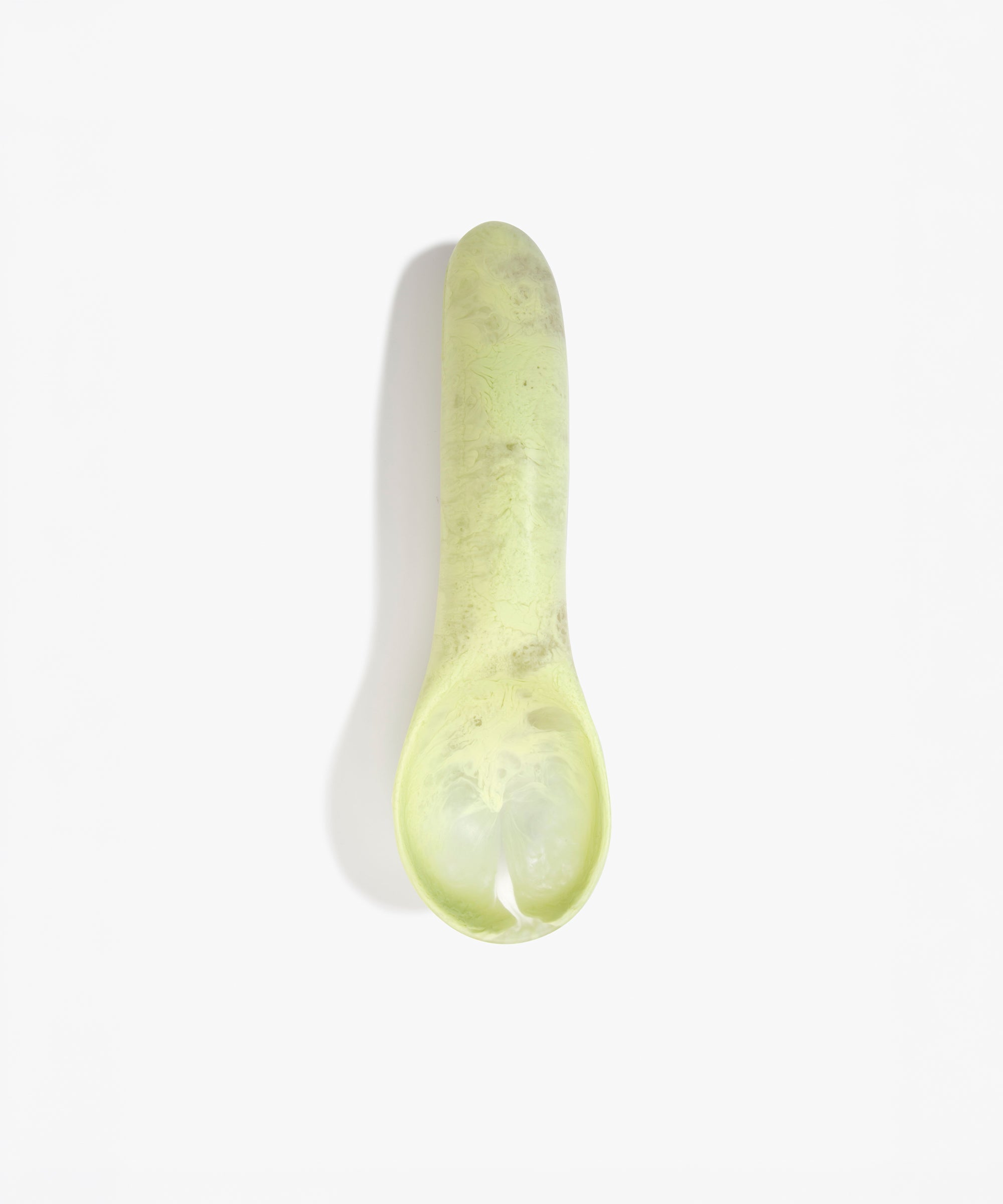 Dinosaur Designs Shell Gelato Scoop in Pistachio — handcrafted marbled pale green resin ice cream scoop with deep rounded bowl and smooth cylindrical handle