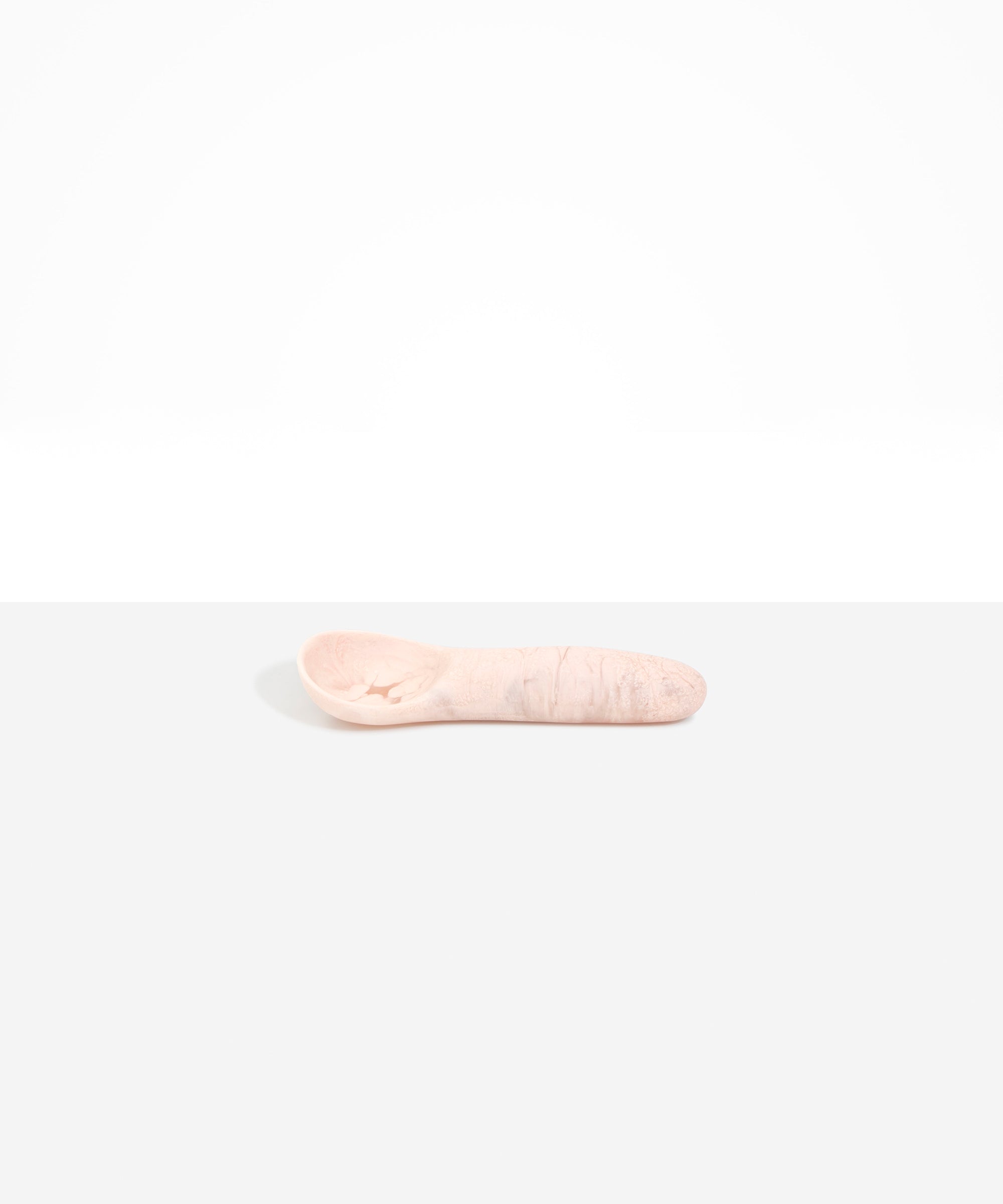 Dinosaur Designs Shell Gelato Scoop in Rose Swirl — handcrafted marbled dusty pink resin ice cream scoop with deep rounded bowl and smooth cylindrical handle