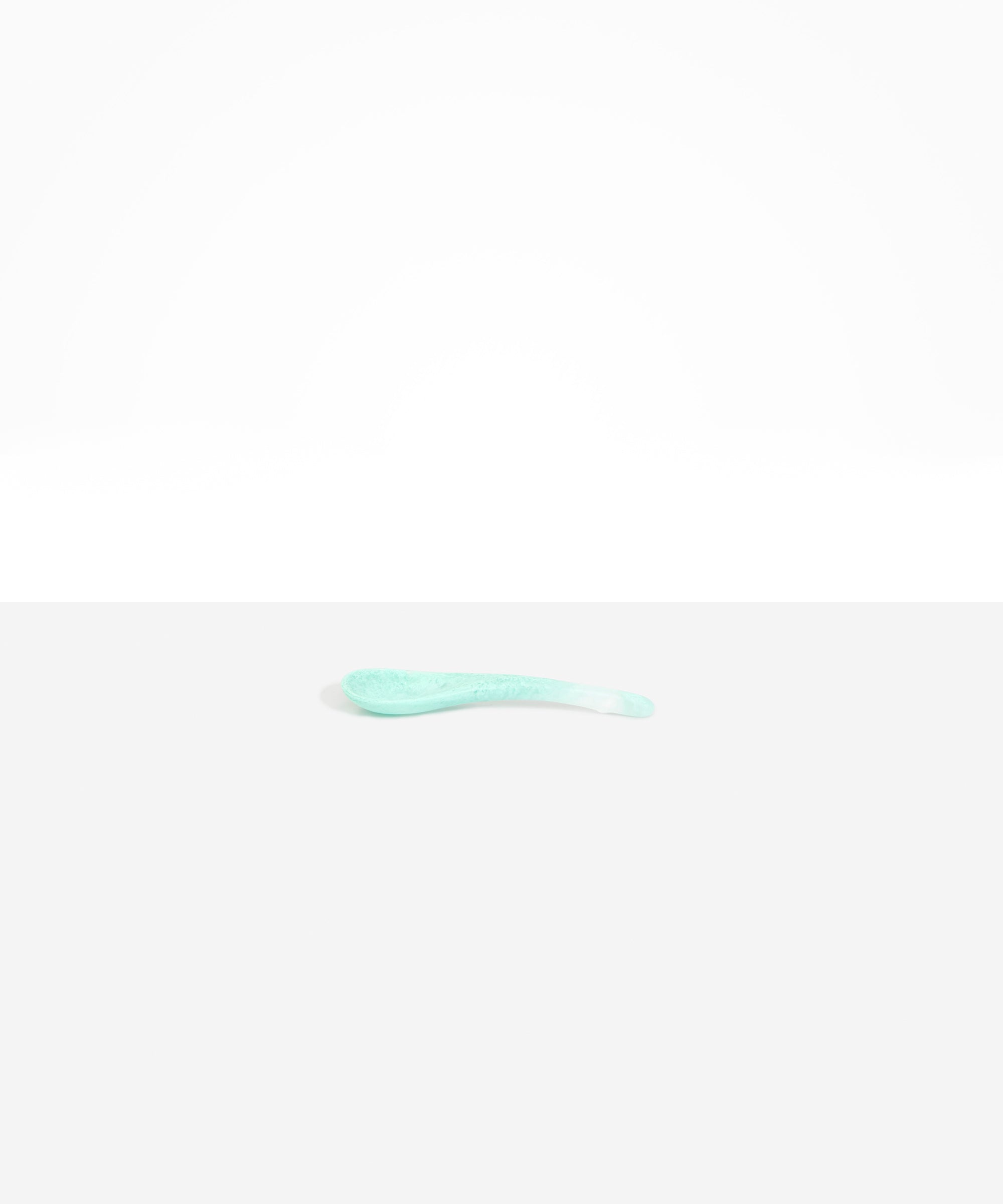 Dinosaur Designs Large Shell Spoon in Mint — handcrafted marbled mint blue resin spoon with slender tapered handle