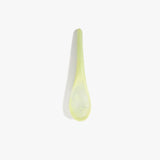 Dinosaur Designs Large Shell Spoon in Pistachio — handcrafted marbled pale green resin spoon with slender tapered handle