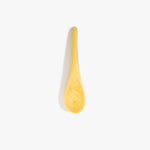 Dinosaur Designs Large Shell Spoon in Pollen — handcrafted marbled yellow resin spoon with slender tapered handle
