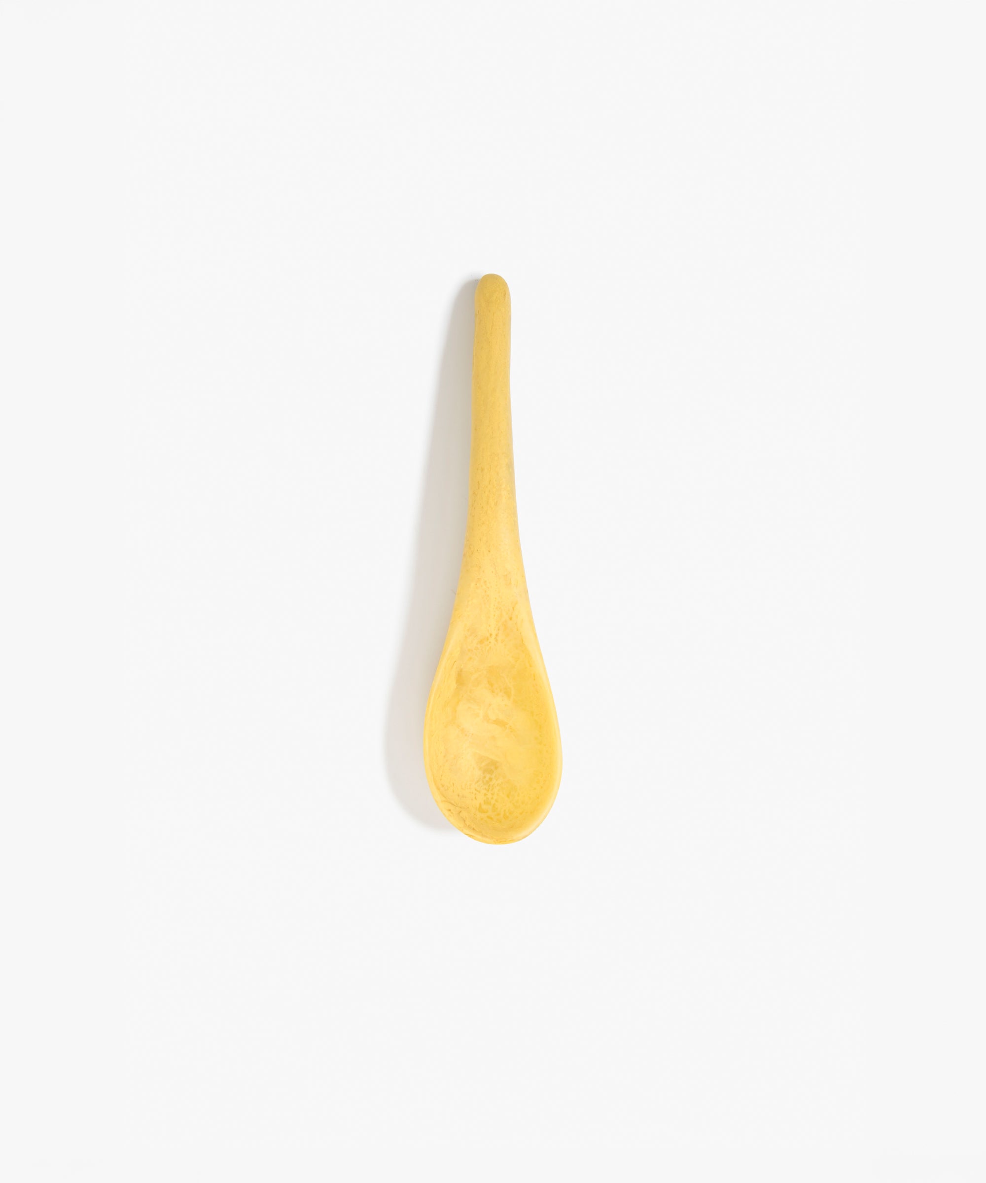Dinosaur Designs Large Shell Spoon in Pollen — handcrafted marbled yellow resin spoon with slender tapered handle
