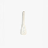 Dinosaur Designs Medium Shell Spoon in Chalk Swirl — handcrafted marbled off-white resin spoon with slender tapered handle