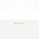 Dinosaur Designs Medium Shell Spoon in Pollen — handcrafted marbled yellow resin spoon with slender tapered handle