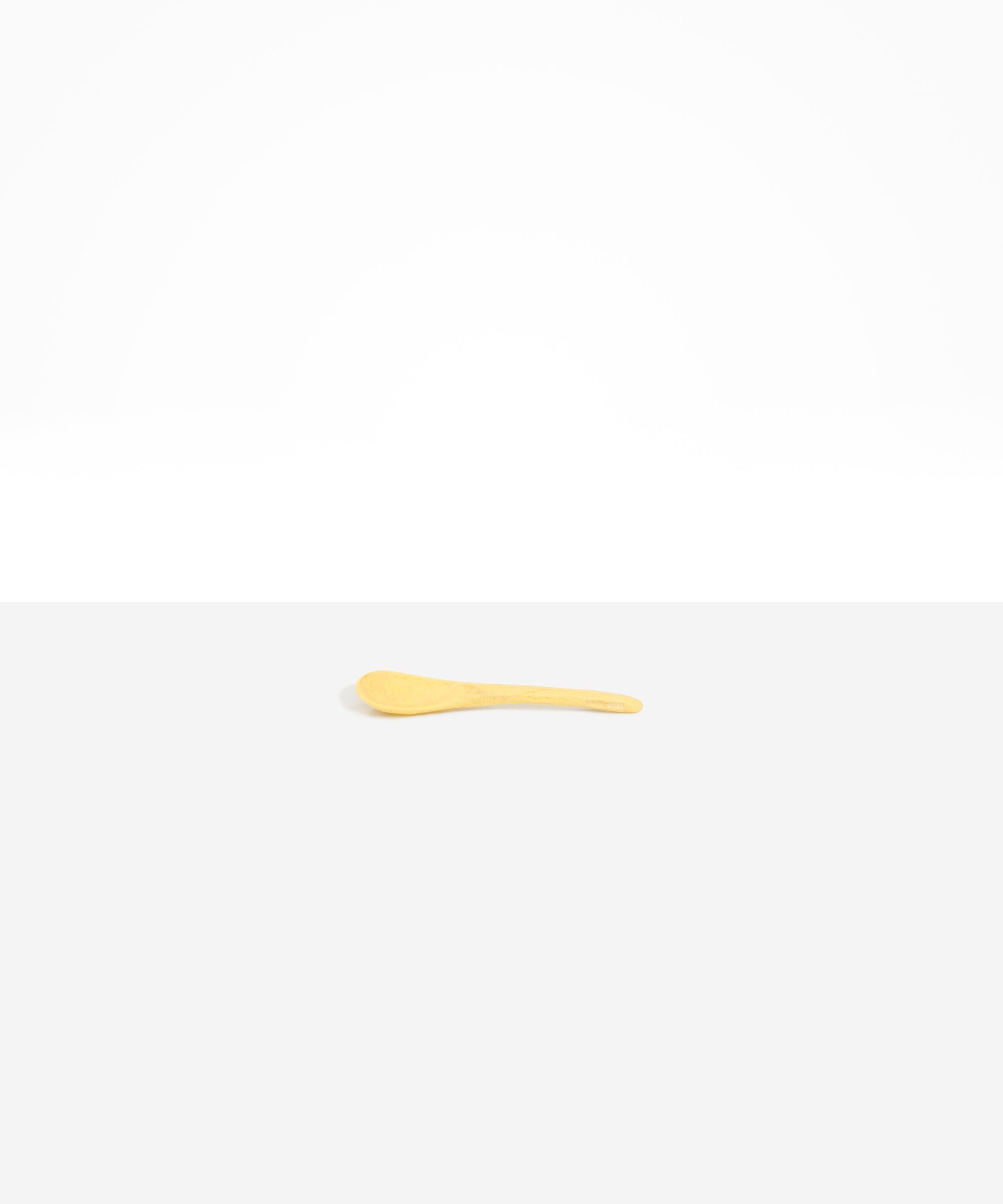 Dinosaur Designs Medium Shell Spoon in Pollen — handcrafted marbled yellow resin spoon with slender tapered handle