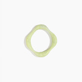 Dinosaur Designs Petal Bangle in Pistachio — handmade marbled pastel green resin bangle with slim undulating organic form