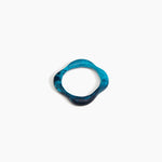 Dinosaur Designs Petal Bangle in Turquoise — handmade marbled teal blue resin bangle with slim undulating organic form