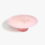 Dinosaur Designs Temple Cake Stand in Blossom — handcrafted marbled pink resin cake stand with wide flat platform and tapered pedestal base