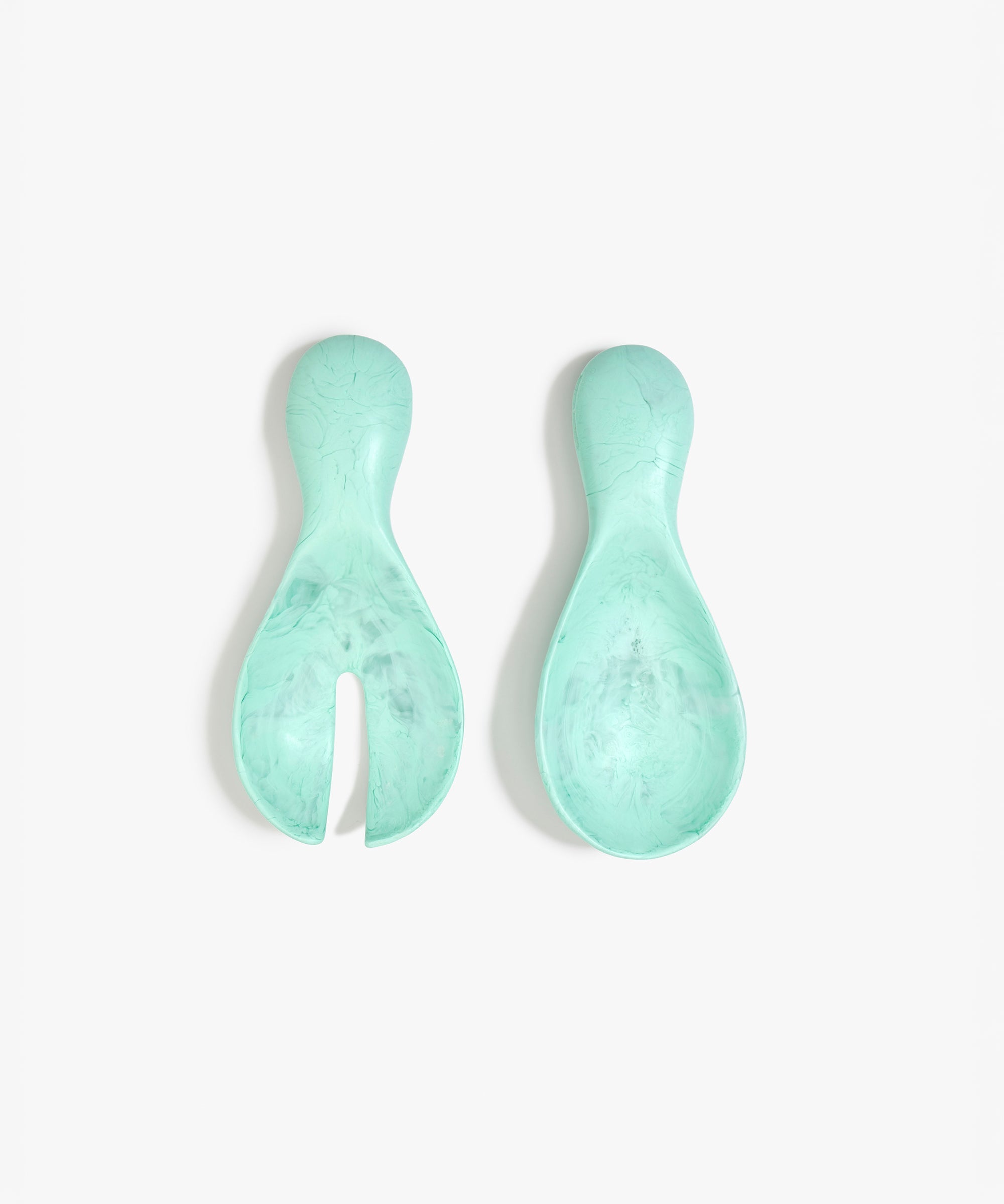 Dinosaur Designs Rock Servers in Mint — handcrafted marbled mint blue resin salad server set with rounded bulb handles, fork and spoon.