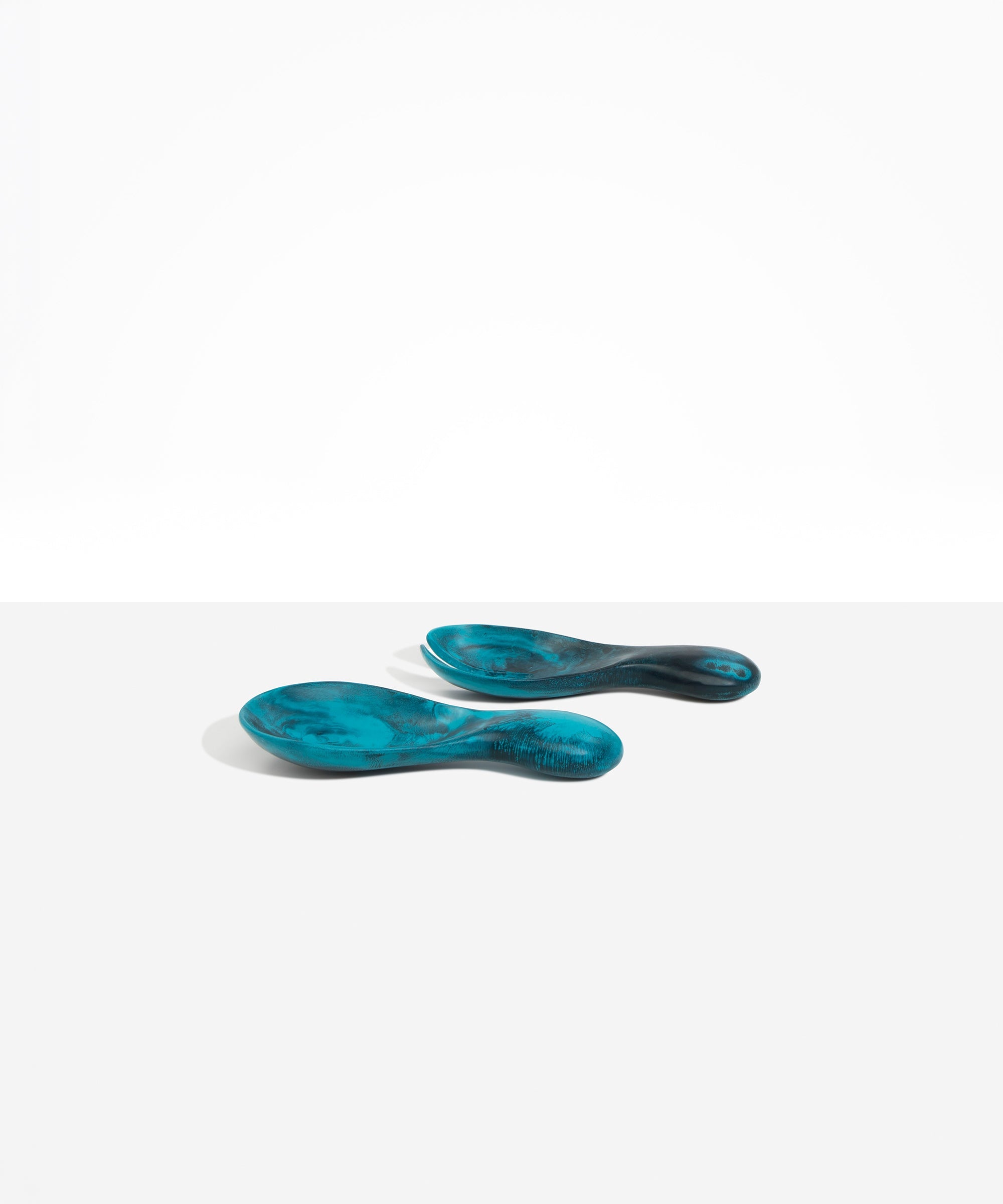 Dinosaur Designs Rock Servers in Turquoise — handcrafted marbled teal blue resin salad server set with rounded bulb handles, fork and spoon.